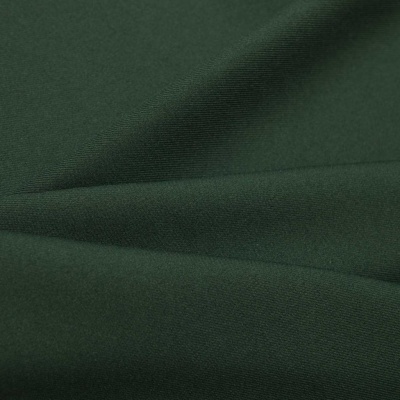 Ткань костюмная 21010 2076, 225 гр/м2, шир.150см, цвет т.зеленый - купить в Ижевске. Цена 394.71 руб.